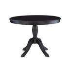 Table ronde à piètement central en bois massif