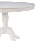 Table ronde à piètement central en bois massif