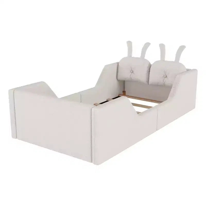 Lit plateforme simple Whisen, cadre de lit rembourré pour enfant au ras du sol avec coussin lapin et barrières latérales amovibles