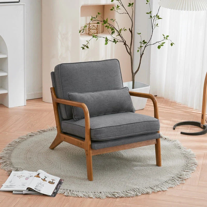 Tapicerowany fotel akcentowy w stylu mid-century modern