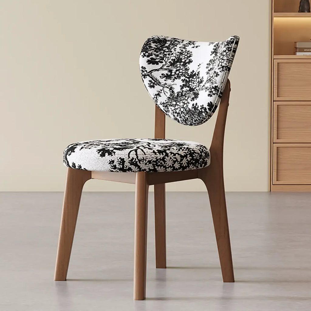 Moderne eetkamerstoel zonder armleuningen, met vleugelrug en kunstleren bekleding