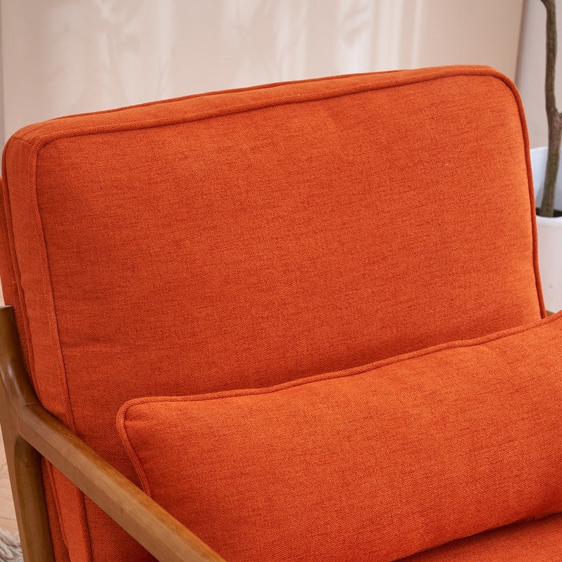 Tapicerowany fotel akcentowy w stylu mid-century modern