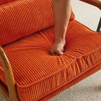 Tapicerowany fotel akcentowy w stylu mid-century modern
