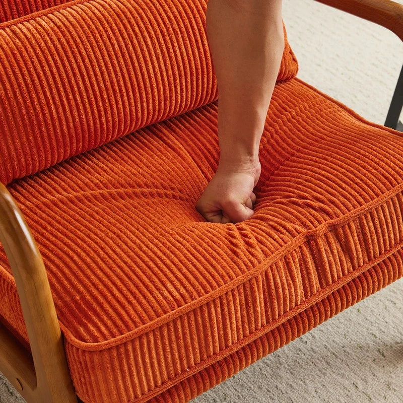 Tapicerowany fotel akcentowy w stylu mid-century modern