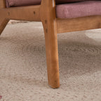 Tapicerowany fotel akcentowy w stylu mid-century modern