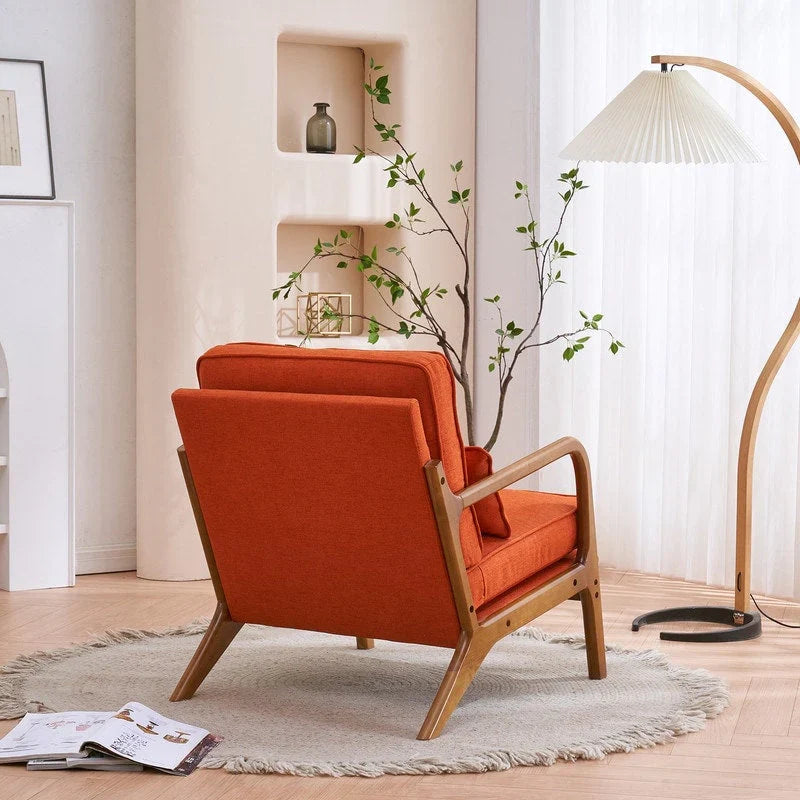 Tapicerowany fotel akcentowy w stylu mid-century modern