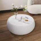 Table basse moderne ronde en forme de tambour Okak avec plateau en marbre et côtés en cuir, table centrale tendance pour le salon ou la chambre