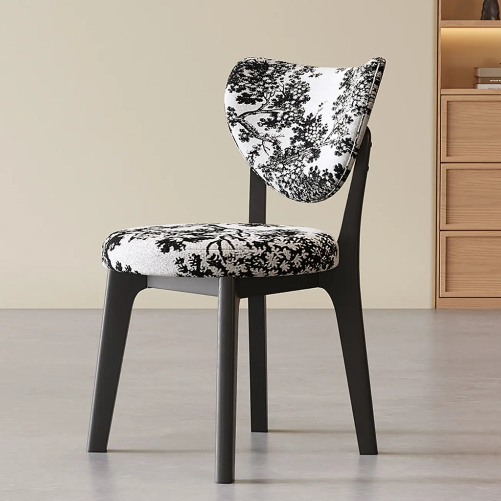 Moderne eetkamerstoel zonder armleuningen, met vleugelrug en kunstleren bekleding