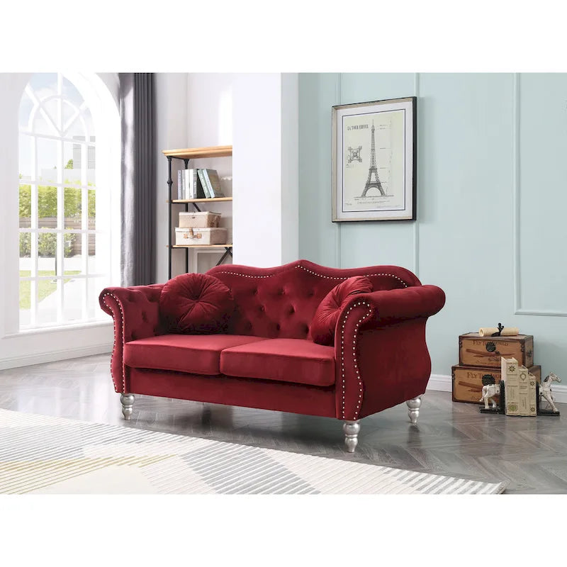 Divanetto in velluto con borchie decorative