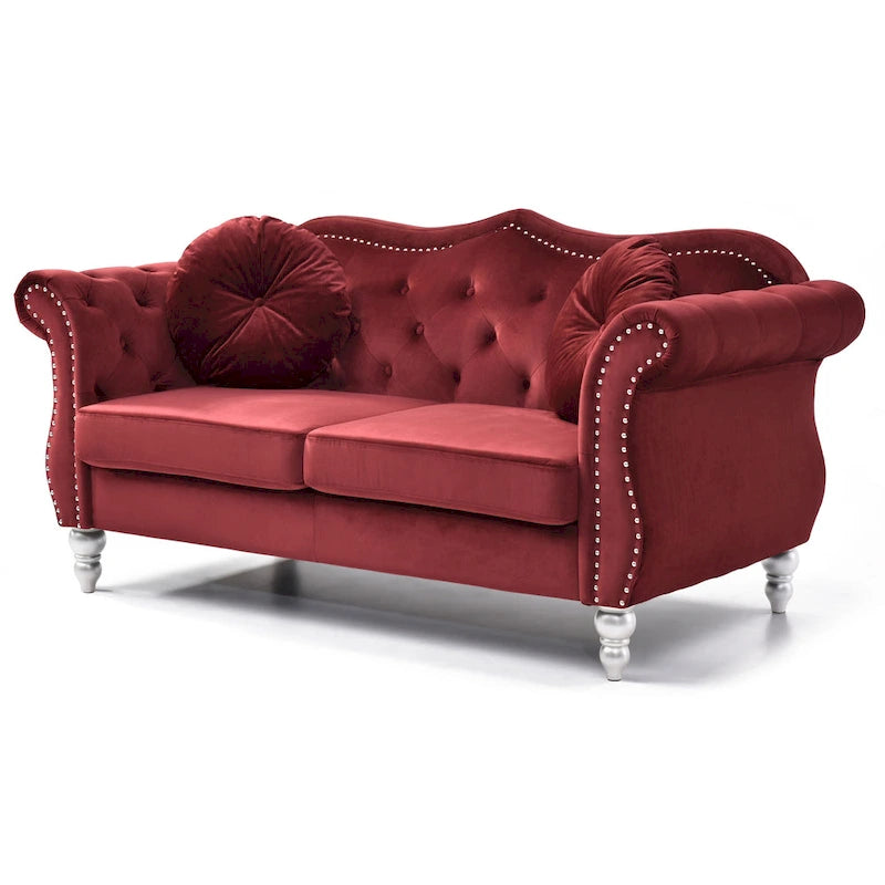Divanetto in velluto con borchie decorative