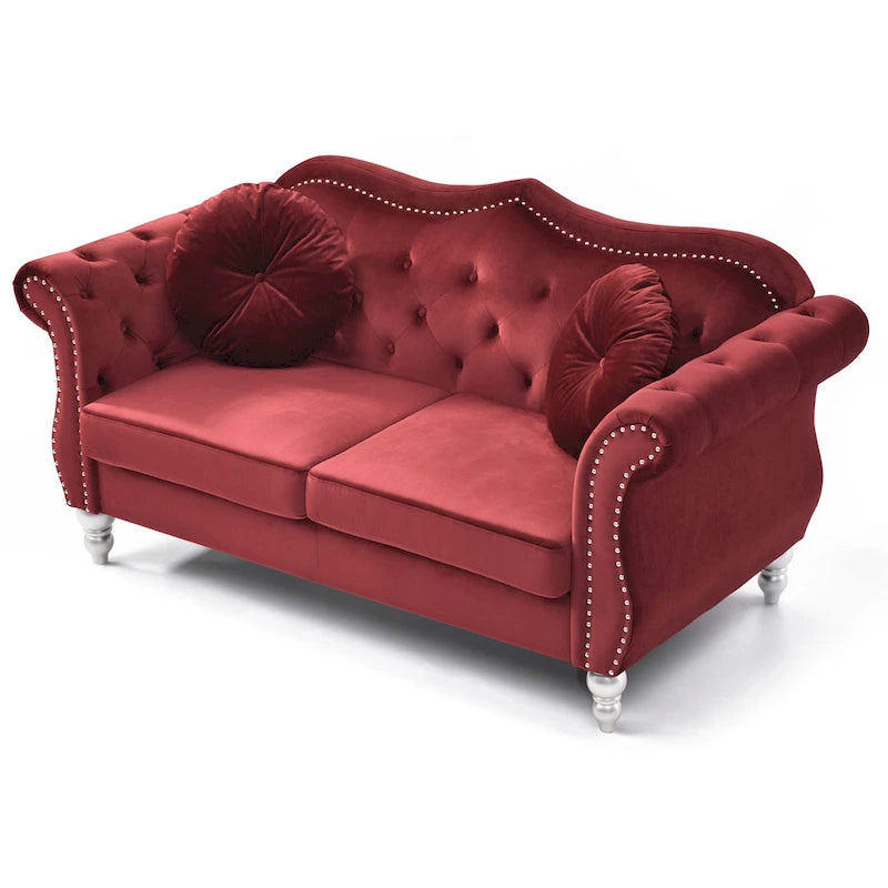 Divanetto in velluto con borchie decorative