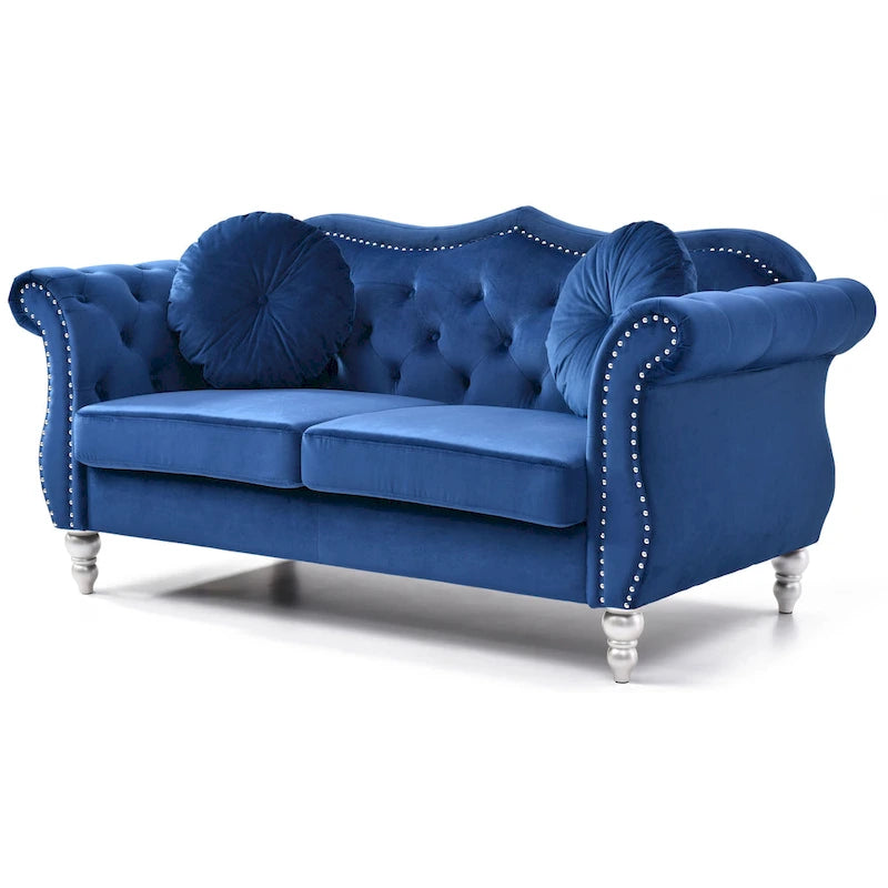 Divanetto in velluto con borchie decorative