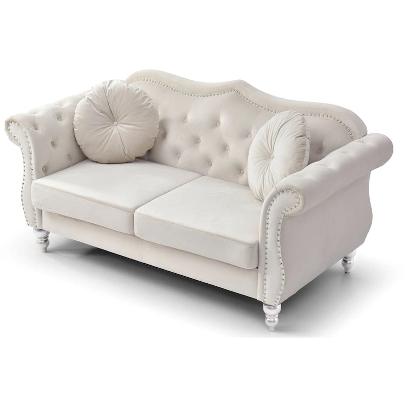 Divanetto in velluto con borchie decorative