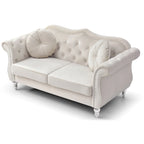 Divanetto in velluto con borchie decorative