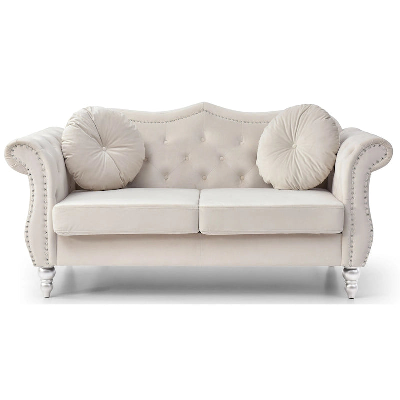 Divanetto in velluto con borchie decorative