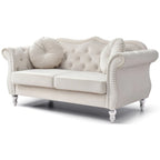Divanetto in velluto con borchie decorative