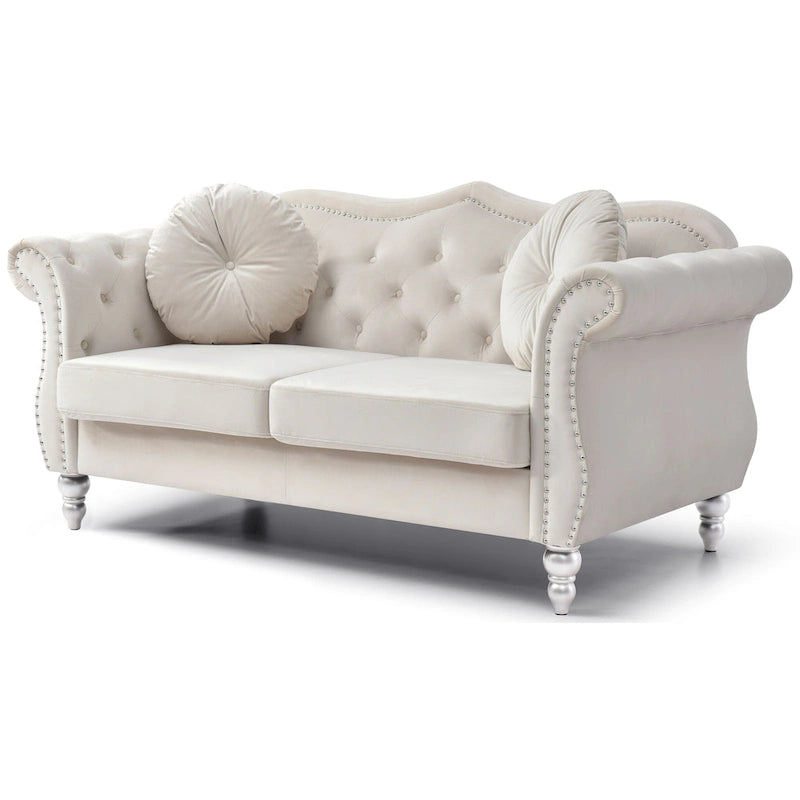 Divanetto in velluto con borchie decorative