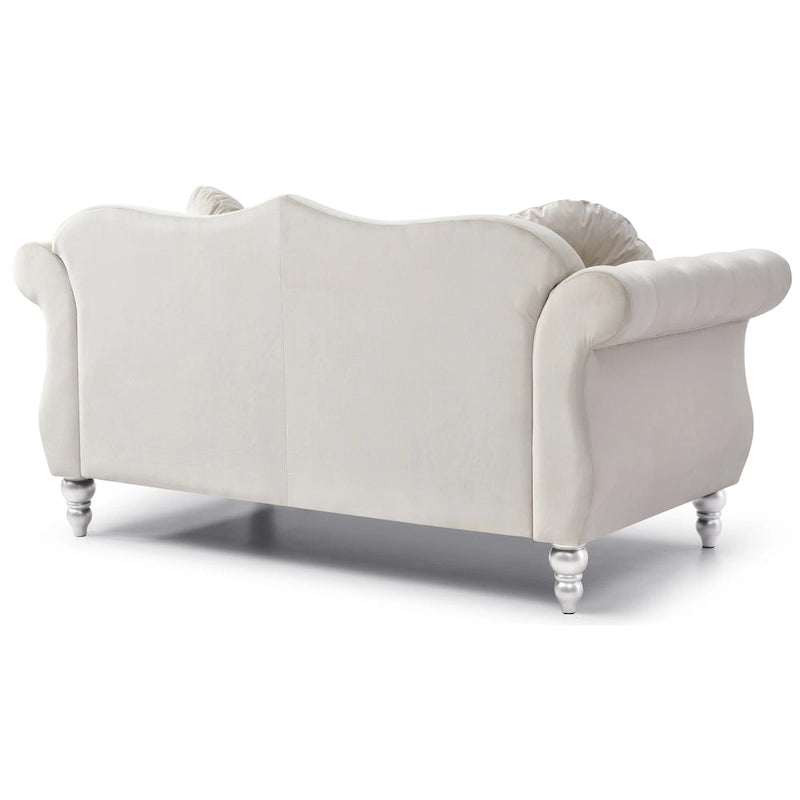 Divanetto in velluto con borchie decorative
