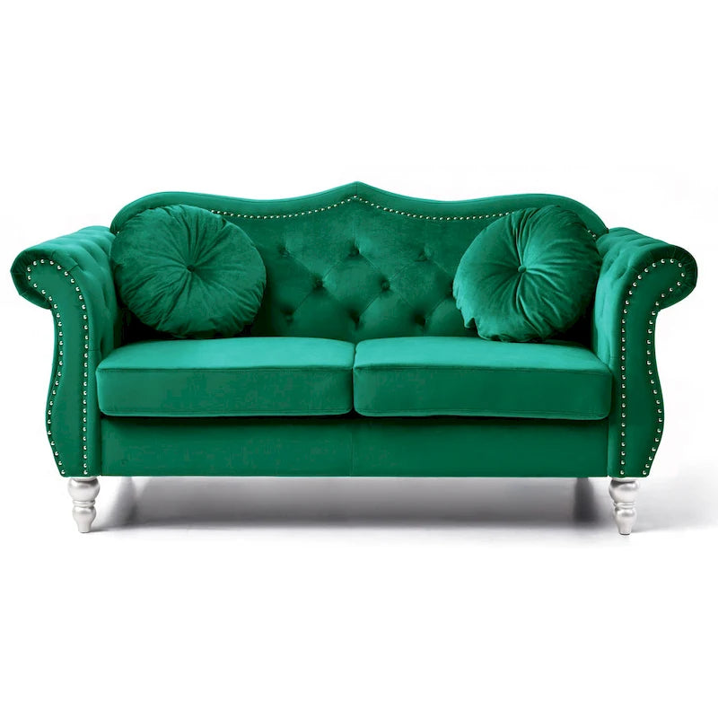 Divanetto in velluto con borchie decorative