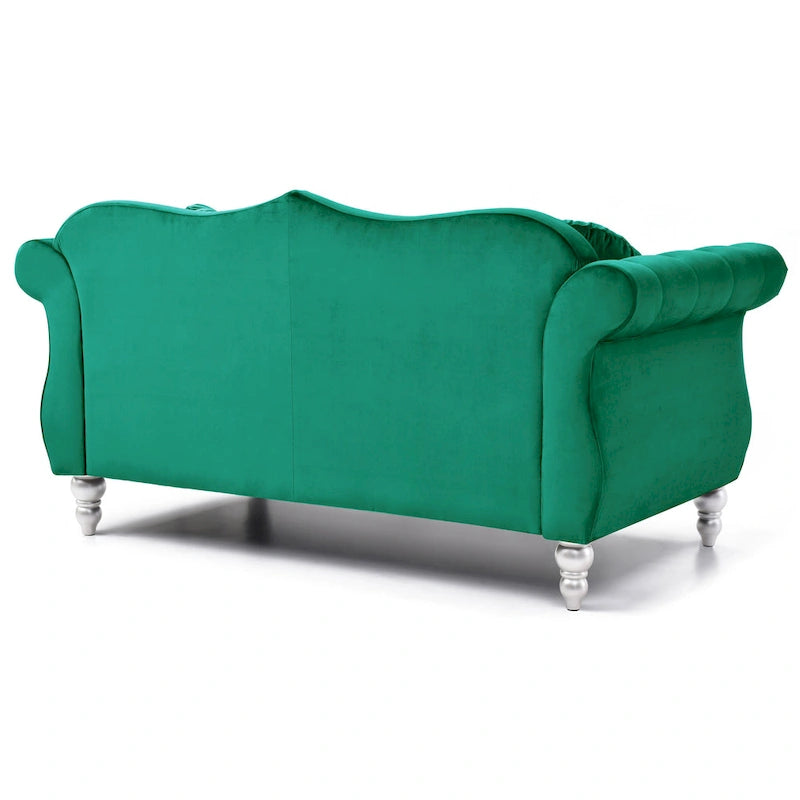 Divanetto in velluto con borchie decorative
