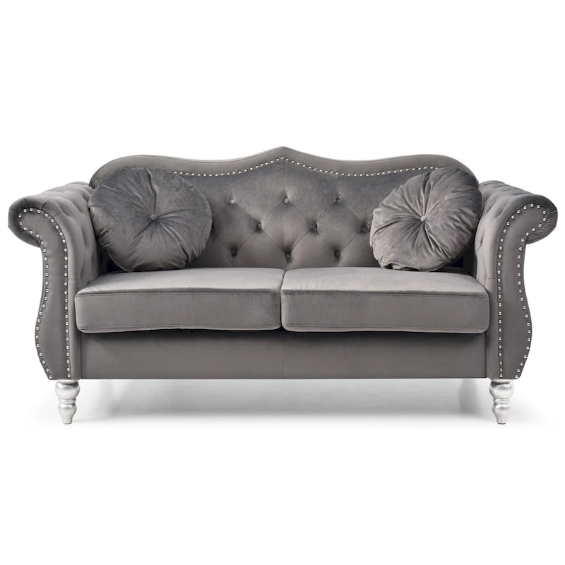 Divanetto in velluto con borchie decorative
