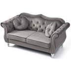 Divanetto in velluto con borchie decorative