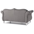 Divanetto in velluto con borchie decorative