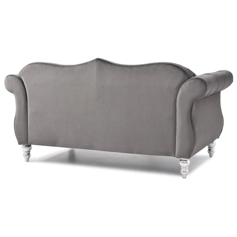 Divanetto in velluto con borchie decorative