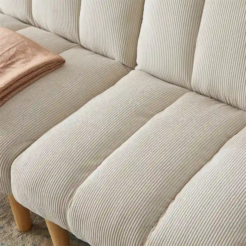 Divano letto convertibile con tessuto in velluto a coste e gambe in legno