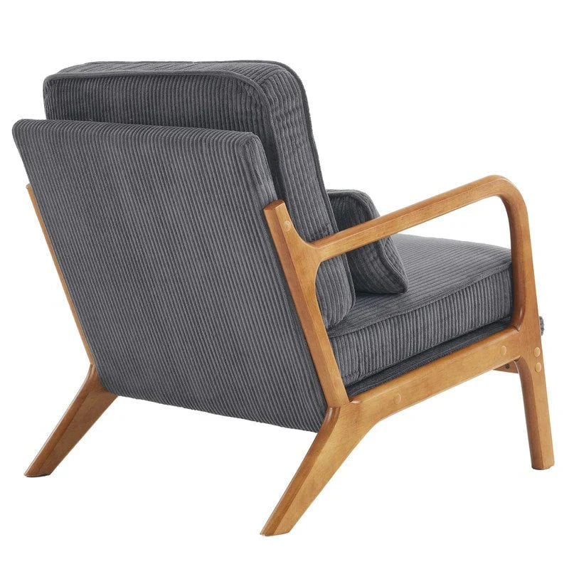 Tapicerowany fotel akcentowy w stylu mid-century modern