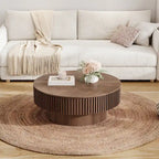 Moderne ronde salontafel van gefineerd massief hout met opbergruimte