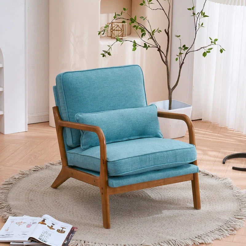 Tapicerowany fotel akcentowy w stylu mid-century modern