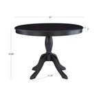 Table ronde à piètement central en bois massif