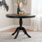 Table ronde à piètement central en bois massif