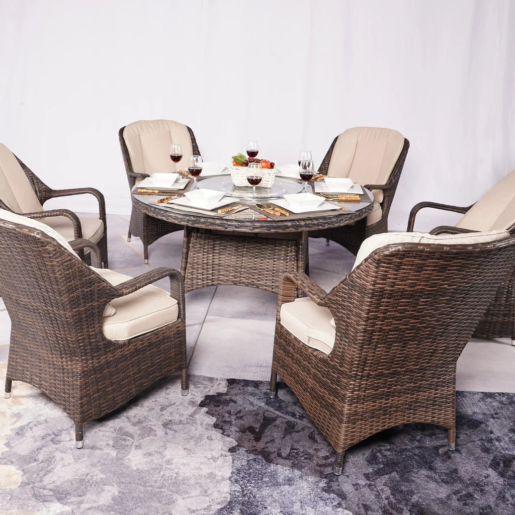 7-delige ronde eethoek voor buiten van gevlochten rotan met kussens van Moda Furnishings